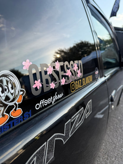 Black Obsessed Cherry Blossom Decal fitted to a vehicle side window