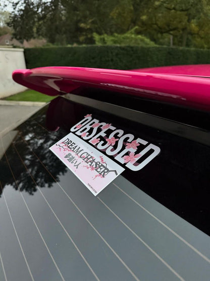 White Obsessed Cherry Blossom Decal fitted beneath a pink rear spoiler