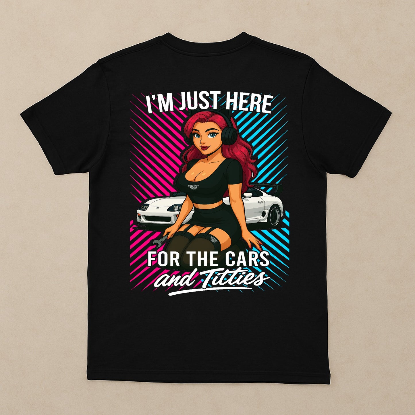 Back of shirt featuring red-haired pin-up girl in two-piece outfit and MK4 Supra with neon backdrop
