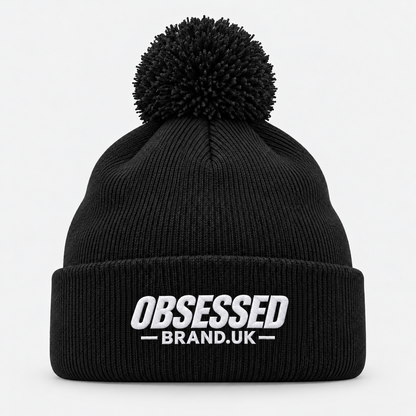 OBSESSED bobble beanie in Black with white embroidered logo