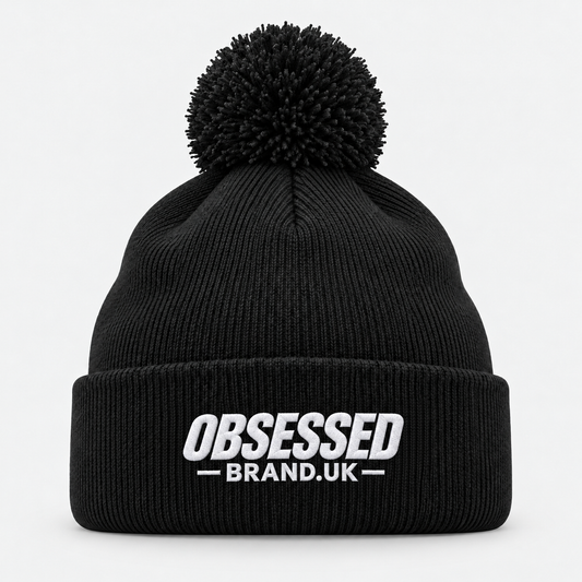 OBSESSED bobble beanie in Black with white embroidered logo