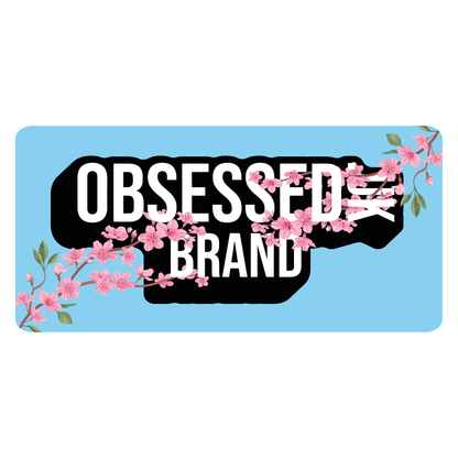 Close-up of the blue cherry blossom Obsessed front logo